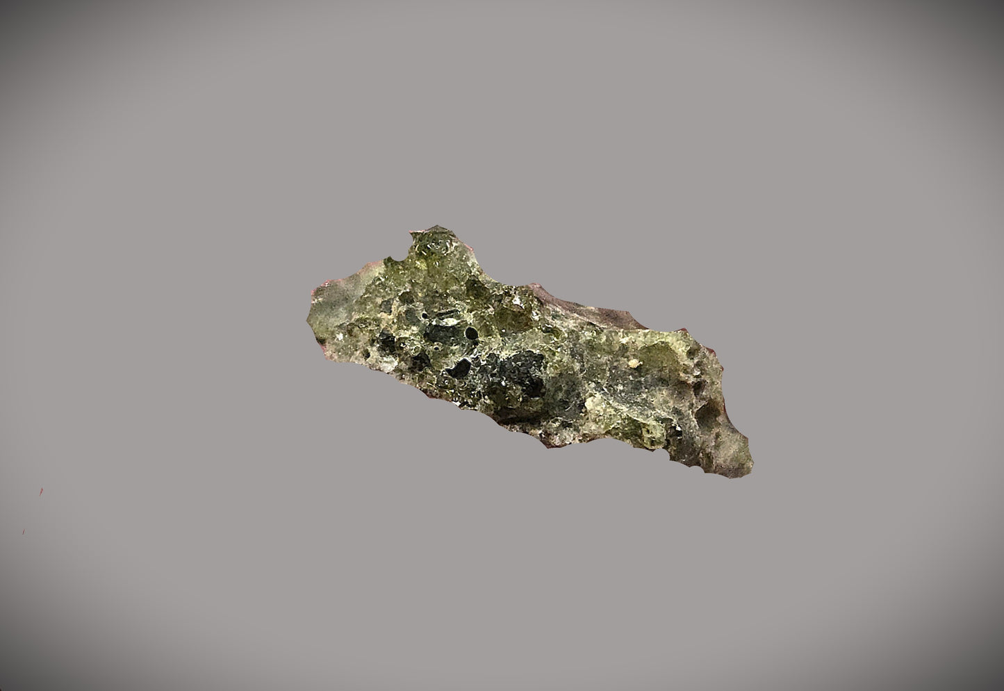 1.0g Dark Glassy Green Trinitite in Leather Clasp Display Case