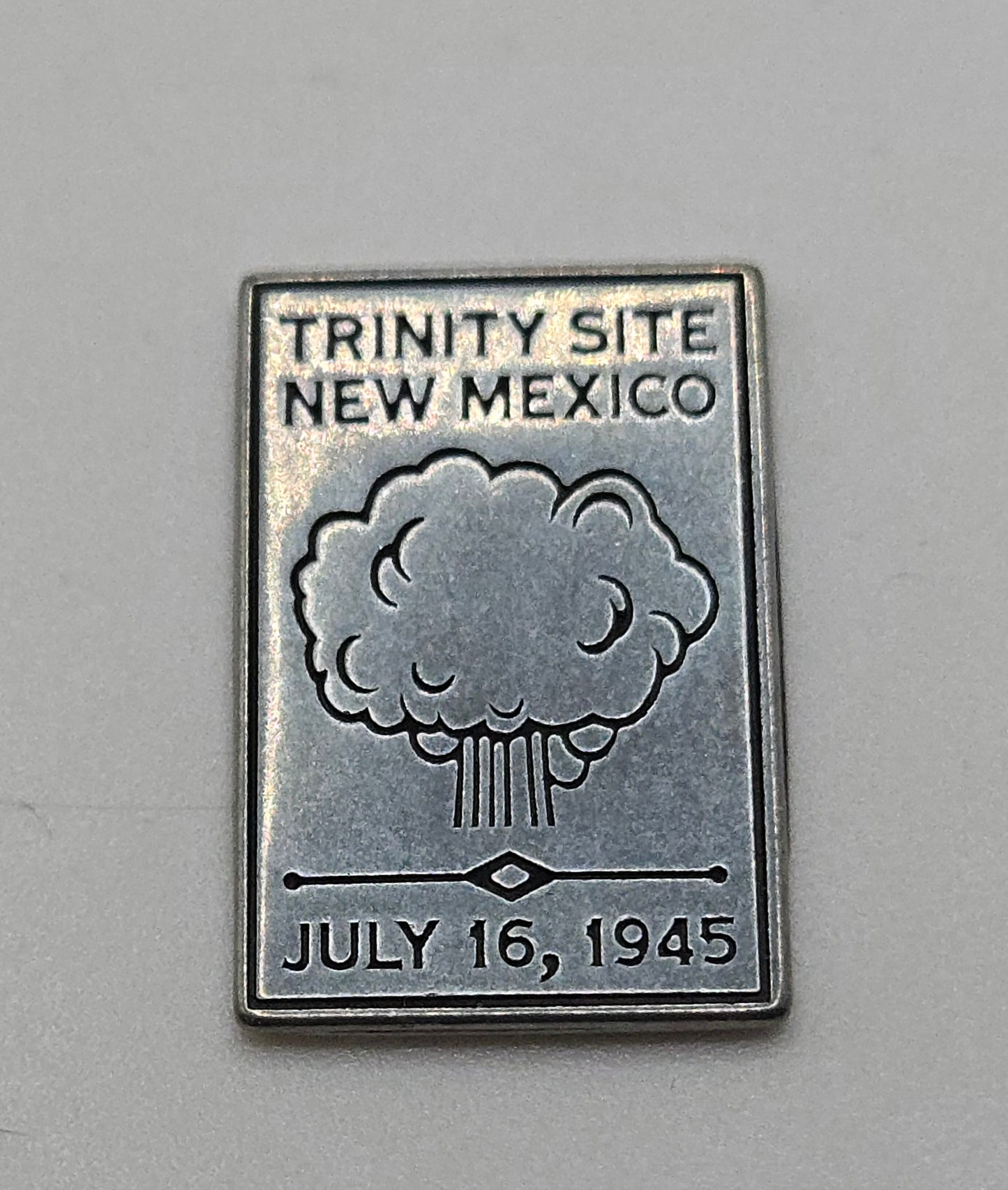 Trinitite with Trinity Token in Case